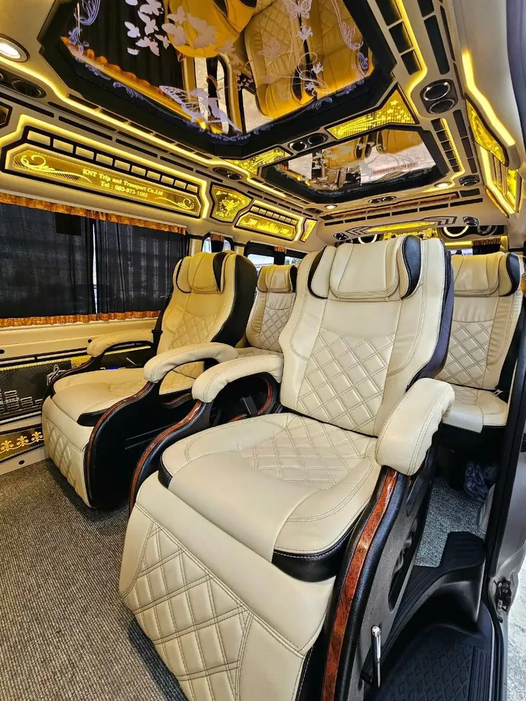 Premium leather seats inside a OneDD Tour VIP van