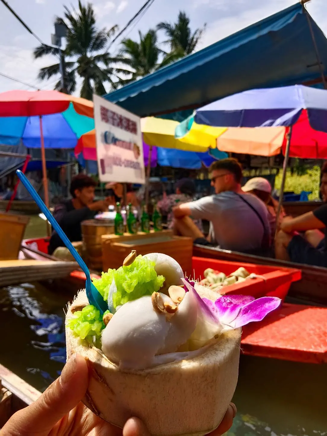 Coconut ice cream at the floating market — a trip with OneDD Tour by KrishHoliday