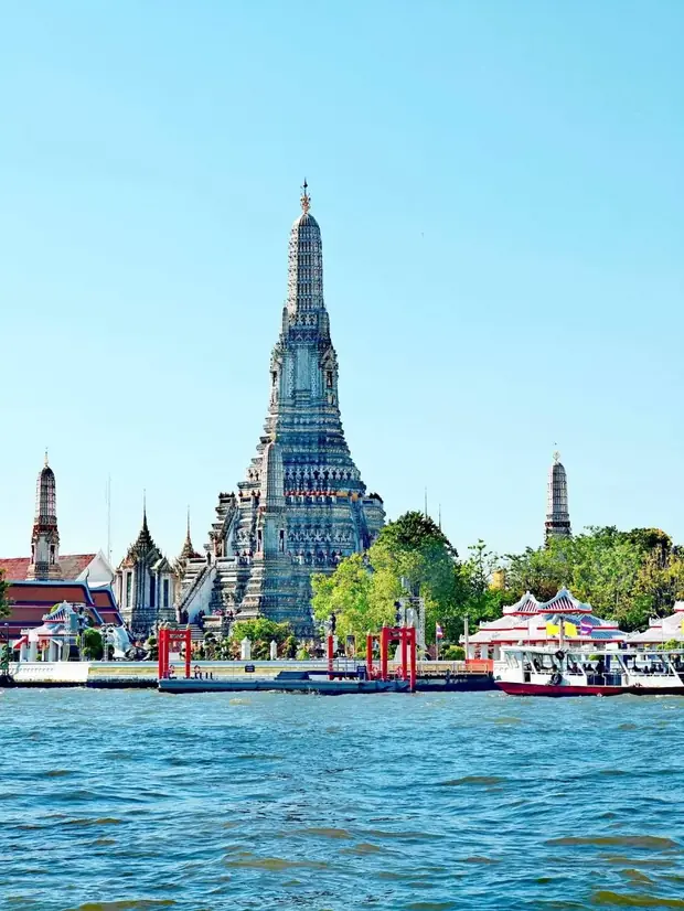 Wat Arun seen from the Chao Phraya River — a trip with OneDD Tour