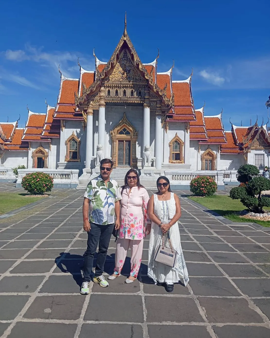 A family at Wat Benchamabophit — a trip with OneDD Tour by KrishHoliday