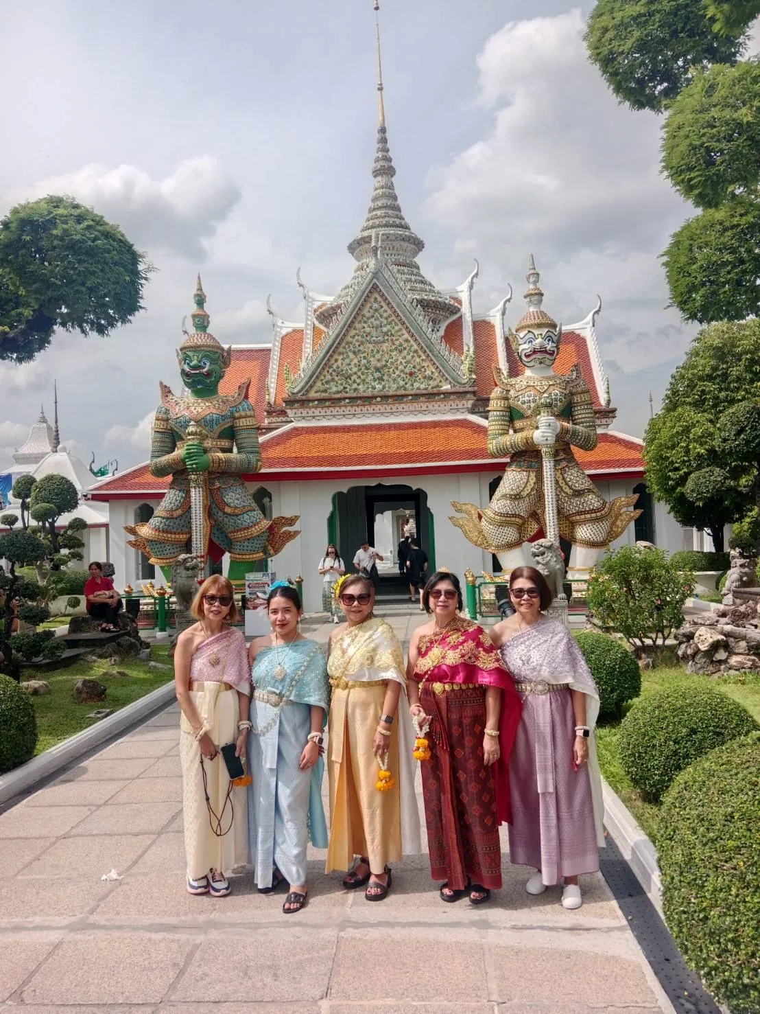 Guests in Thai dress at Wat Pho — a trip with OneDD Tour by KrishHoliday